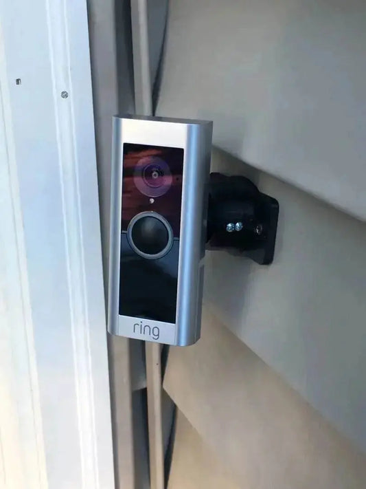 Doorbell mounted on a adjustable swivel mount mounted sideways