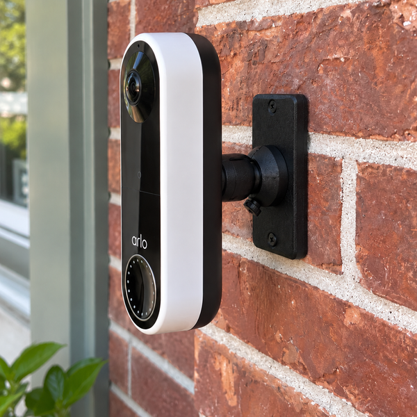 Arlo Essential Wire-Free AVD2001 on black 90 degree adjustable swivel mount, left-facing porch installation