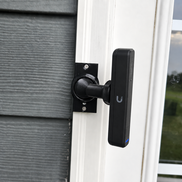 UniFi G6 Entry on a black swivel mount with full conforming rear bracket, primary porch view
