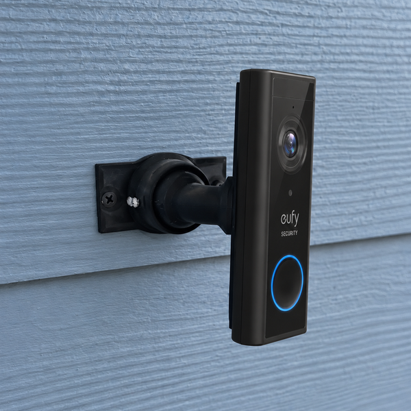 Eufy S220 battery video doorbell installed on 15–90 degree adjustable swivel mount, right-facing installation