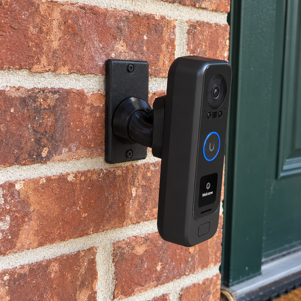 UniFi G4 Doorbell Pro PoE Kit on a right-facing adjustable swivel mount in a realistic porch setting