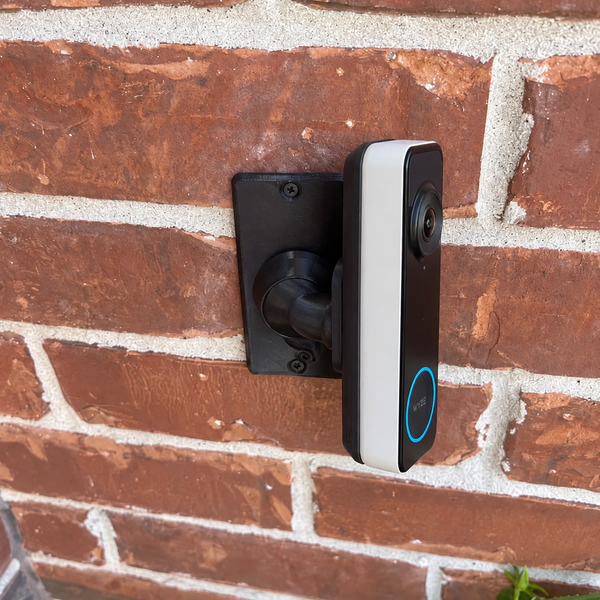 Wyze Battery Video Doorbell (2025) on black 90 degree adjustable swivel mount, right-facing porch installation